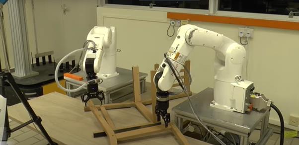 ?Industrial robots get human touch